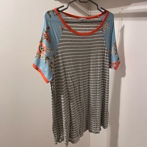 Soft blouse. Gray and white stripes with floral sleeves.